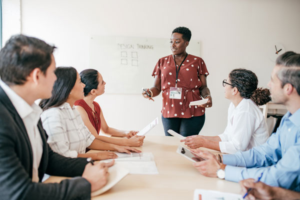 Woman leading a meeting in a board room