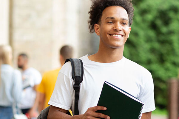 Happy student on campus